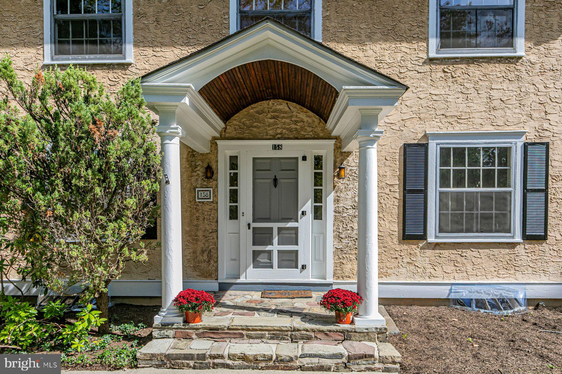 158 Carter Road Princeton, NJ 08540 - Photo 3 of 29 a front view of a house with a porch