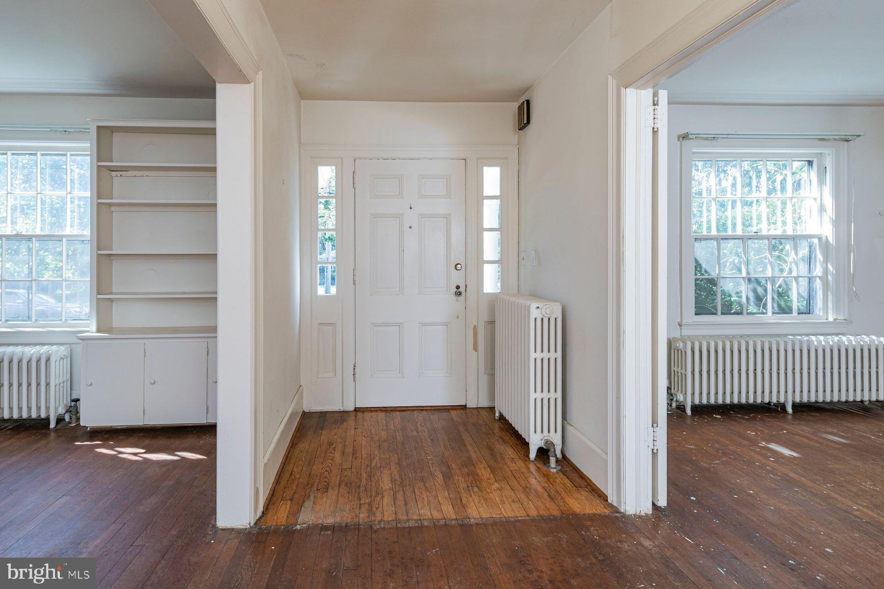 158 Carter Road Princeton, NJ 08540 - Photo 4 of 29 a view of a room with wooden floor and windows