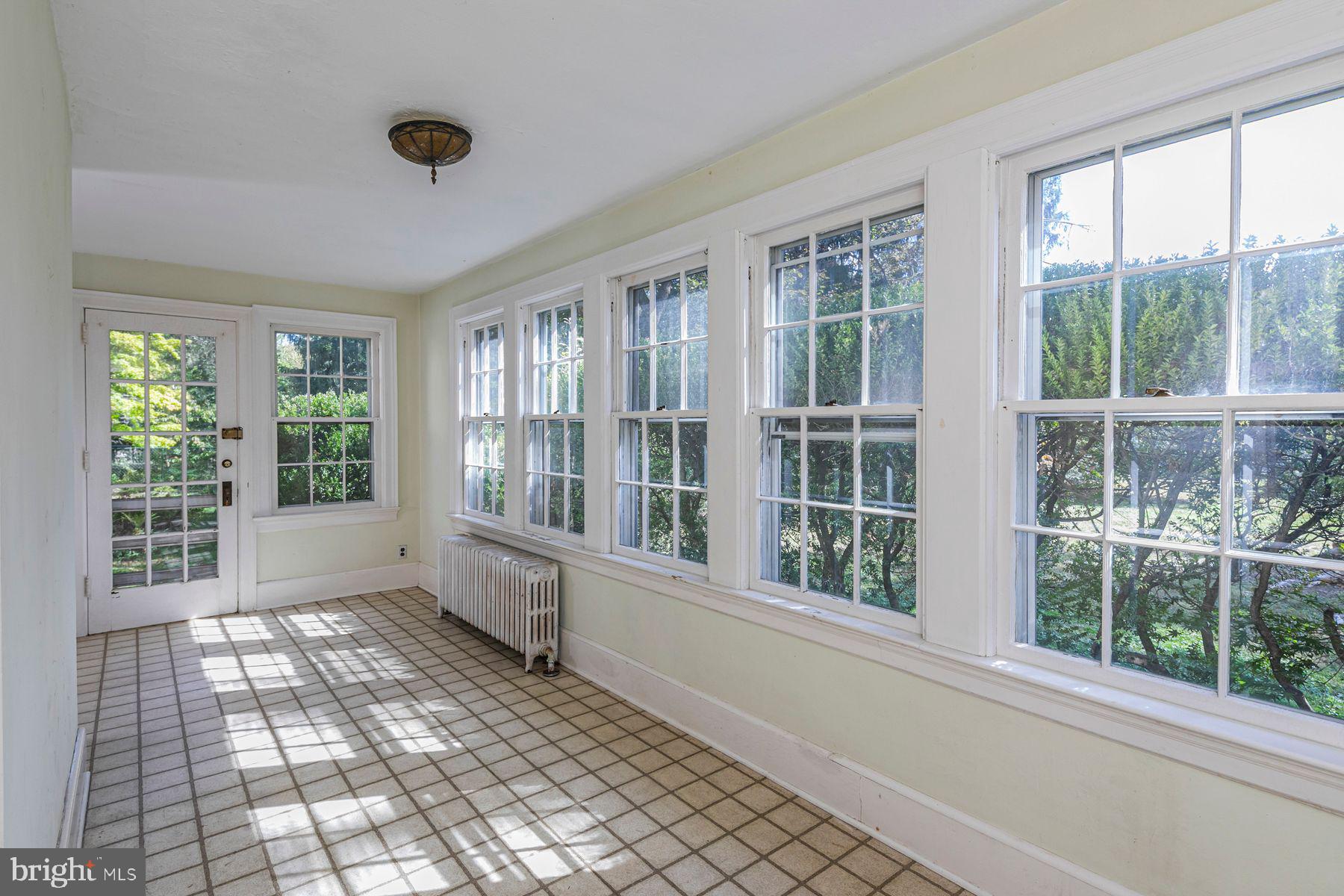158 Carter Road Princeton, NJ 08540 - Photo 7 of 29 a view of empty room with windows