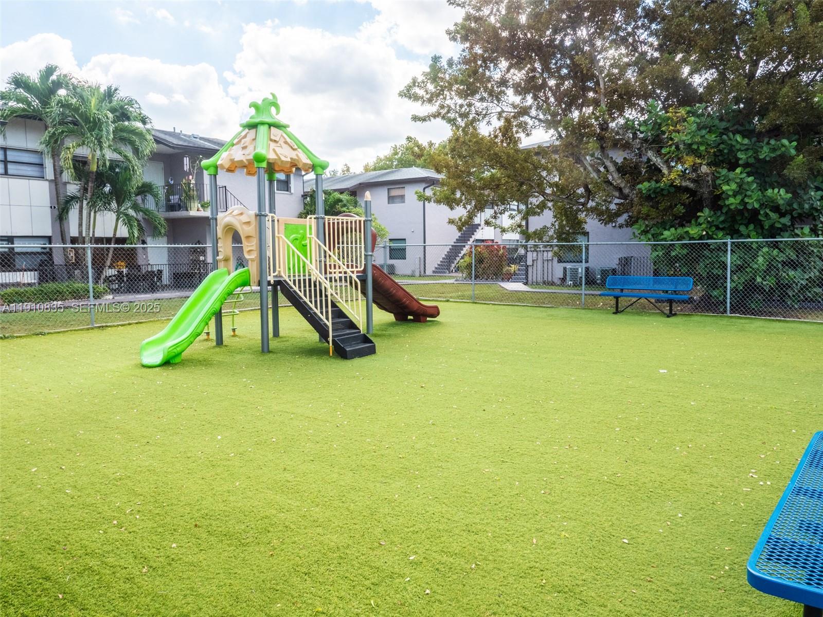 13241 Southwest 17th Lane, Unit 234 Miami, FL 33175 - Photo 16 of 16 a view of a house with swimming pool