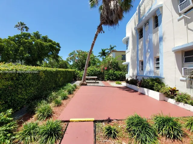 a view of a garden with a pathway