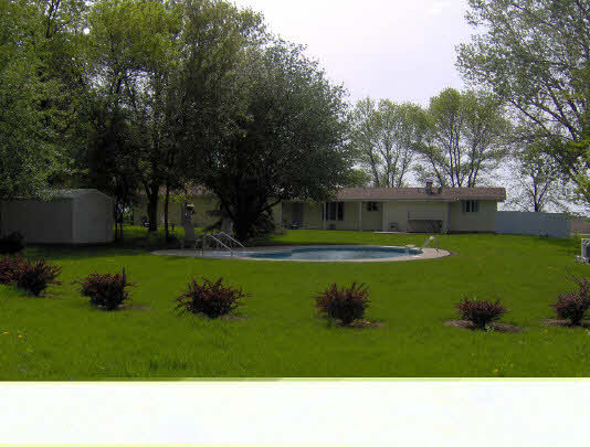 7711 South Thorpe Road Rochelle, IL 61068 - Photo 3 of 6 a outdoor view with a play ground