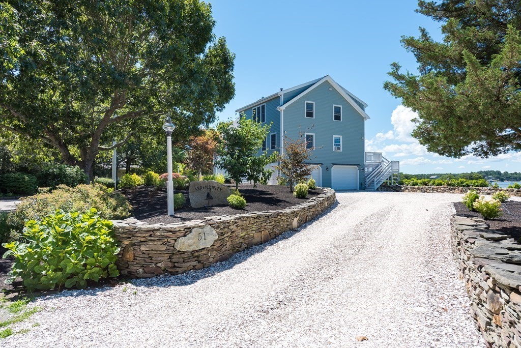 51 Robinwood Road Wareham, MA 02532 - Photo 2 of 42 a front view of a house with a yard