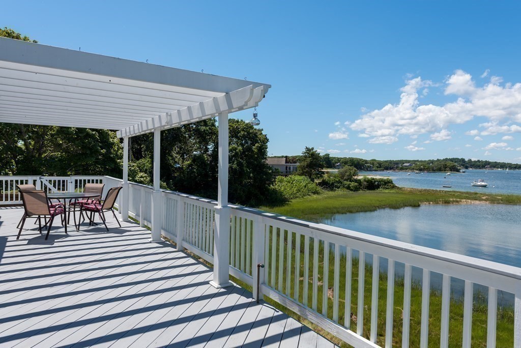 51 Robinwood Road Wareham, MA 02532 - Photo 26 of 42 a view of a chair and tables in the balcony