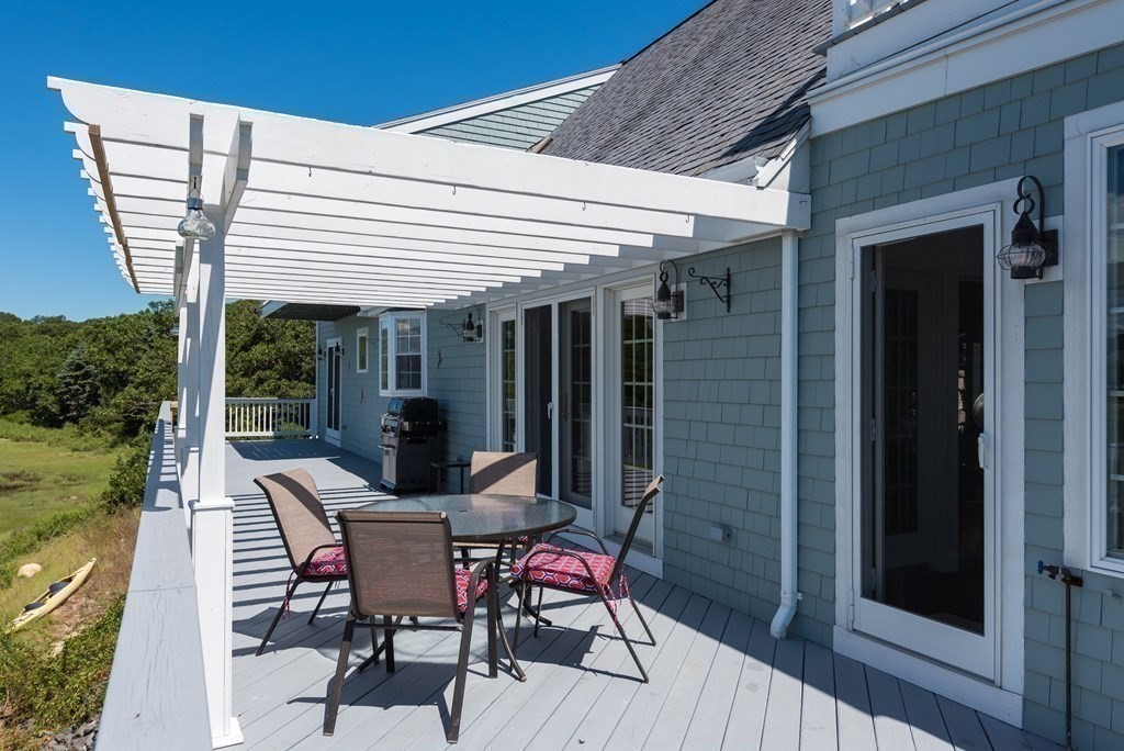 51 Robinwood Road Wareham, MA 02532 - Photo 28 of 42 a view of a house with backyard and sitting area