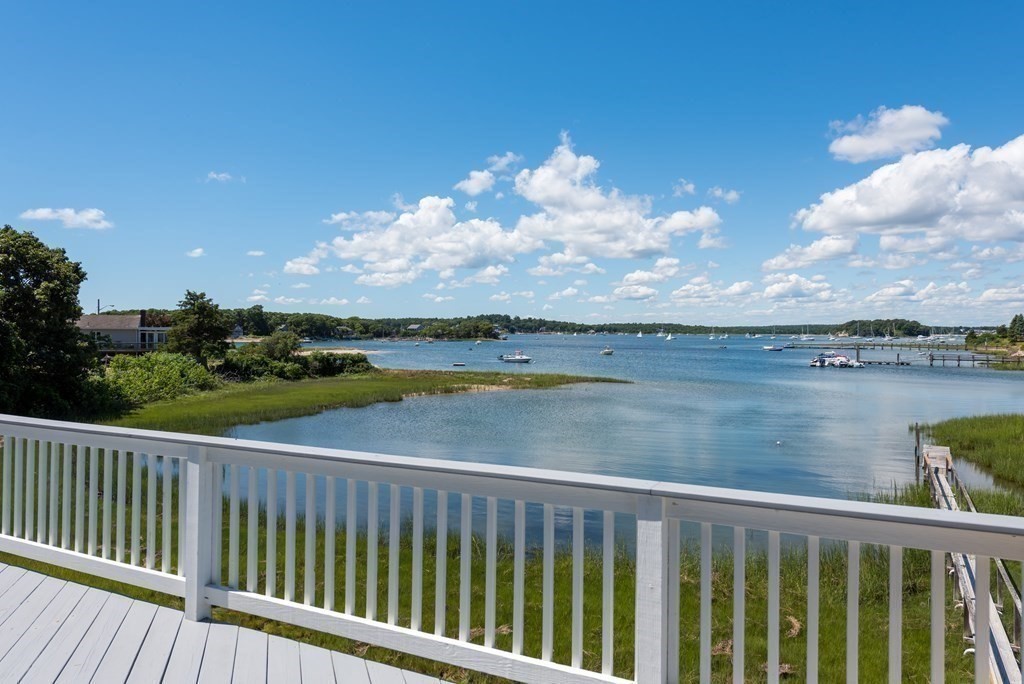 51 Robinwood Road Wareham, MA 02532 - Photo 30 of 42 a view of a lake from a balcony