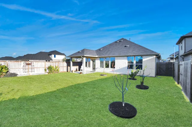 a house view with a garden space
