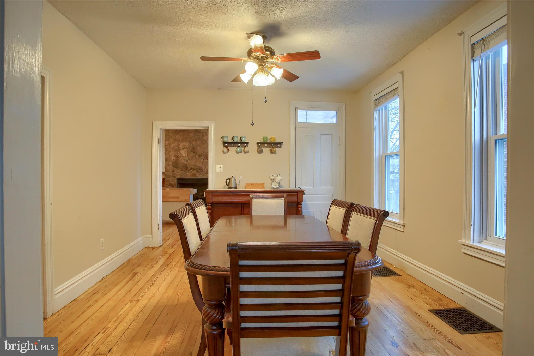 147 A Street Carlisle, PA 17013 - Photo 11 of 55 a view of a dining room with furniture and a chandelier