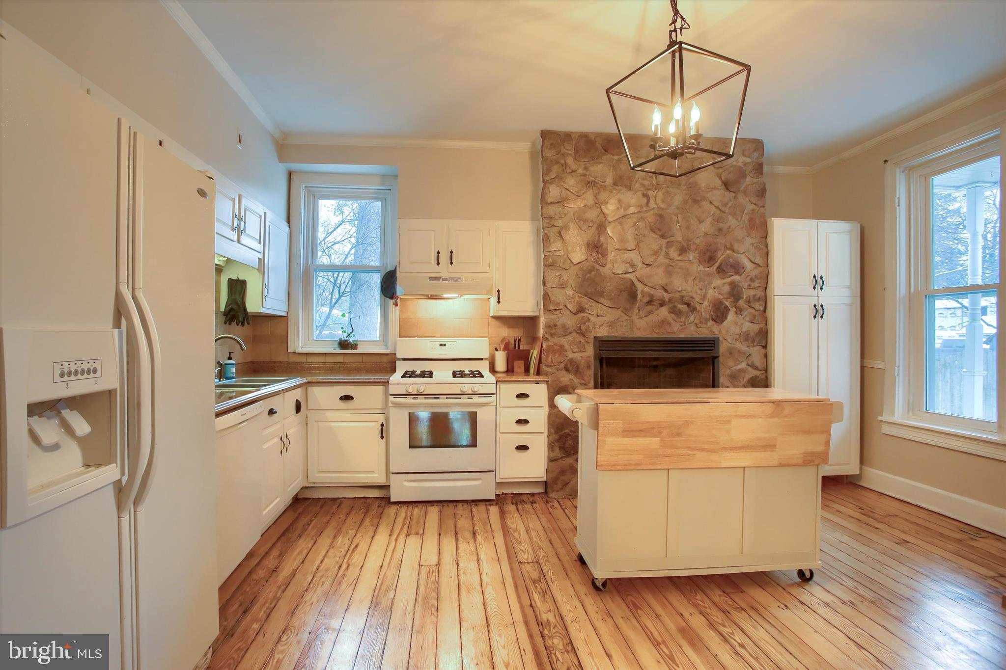147 A Street Carlisle, PA 17013 - Photo 14 of 55 a kitchen with a stove a sink and a refrigerator
