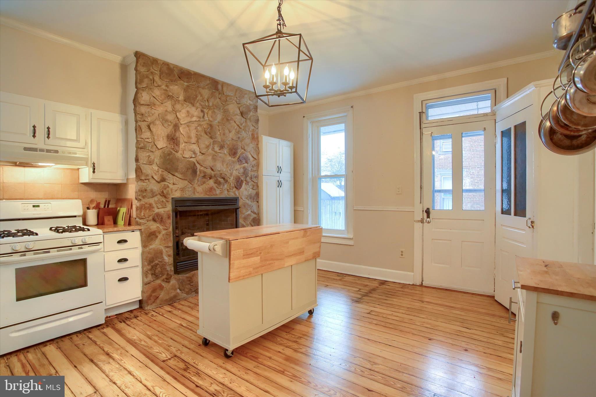 147 A Street Carlisle, PA 17013 - Photo 15 of 55 a kitchen with stainless steel appliances granite countertop a stove and a refrigerator