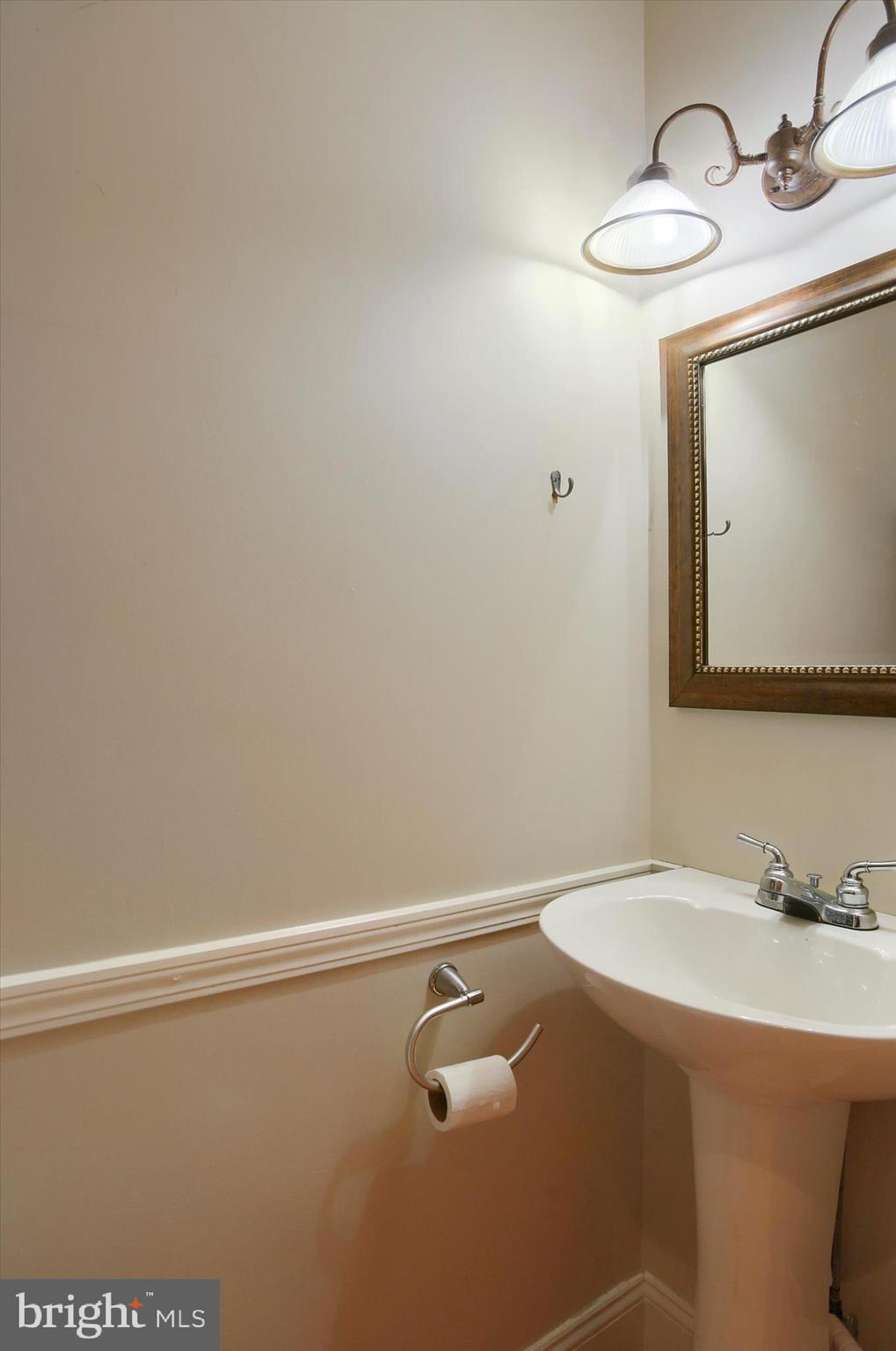 147 A Street Carlisle, PA 17013 - Photo 18 of 55 a bathroom with a sink and a mirror