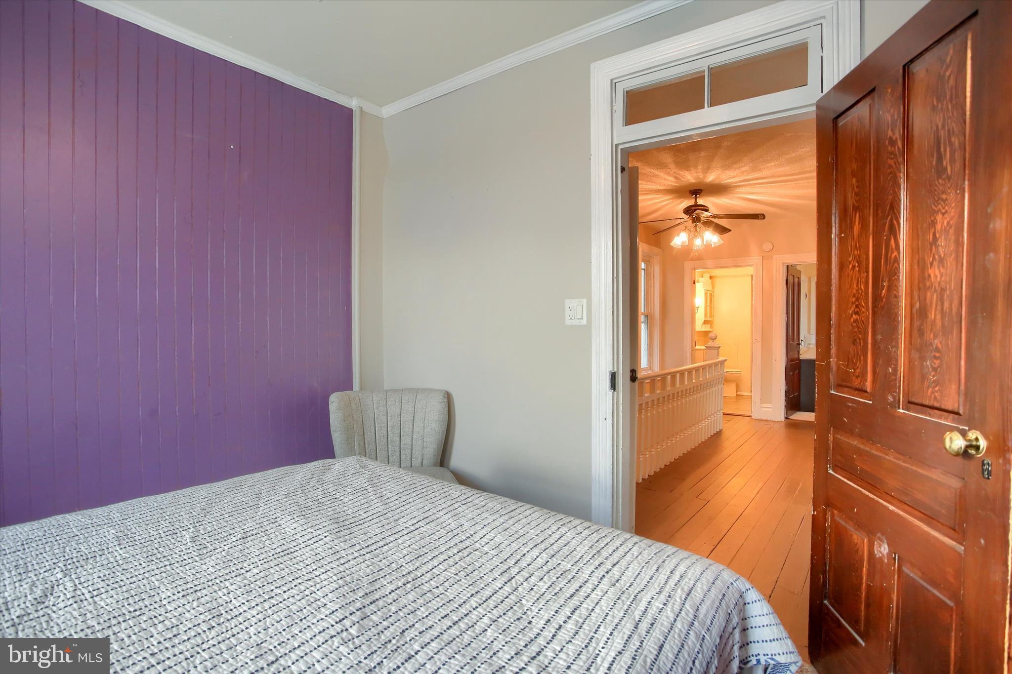 147 A Street Carlisle, PA 17013 - Photo 20 of 55 a bedroom with a bed and a chandelier