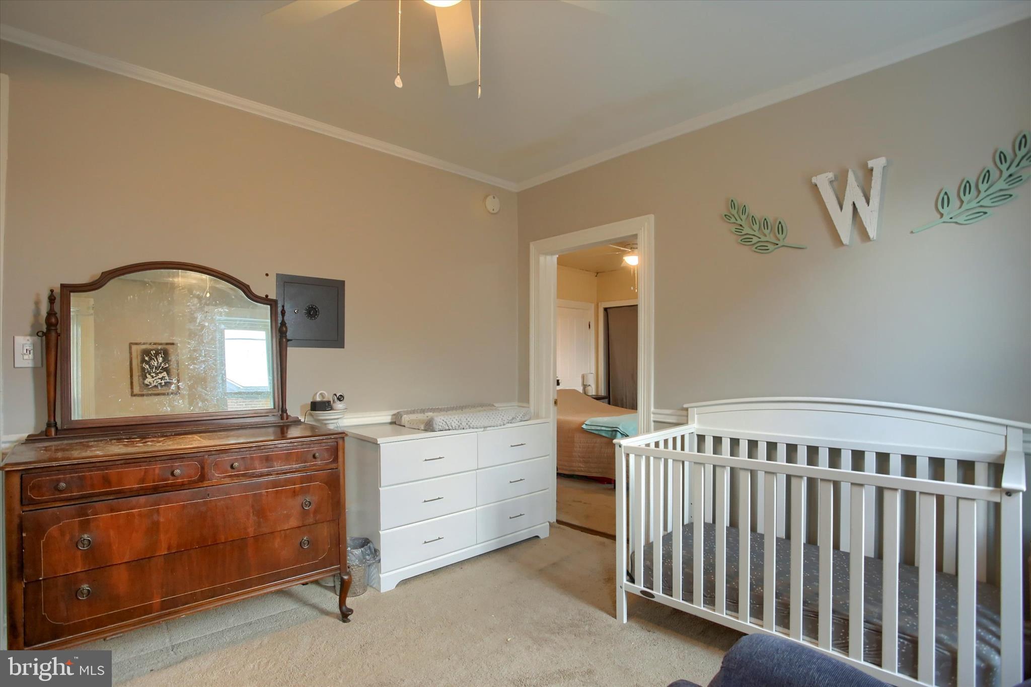 147 A Street Carlisle, PA 17013 - Photo 24 of 55 a bedroom with a bed and a mirror on dresser