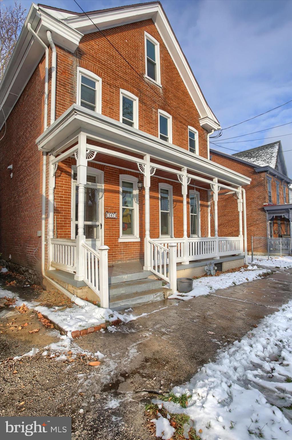 147 A Street Carlisle, PA 17013 - Photo 3 of 55 a front view of a house with a street