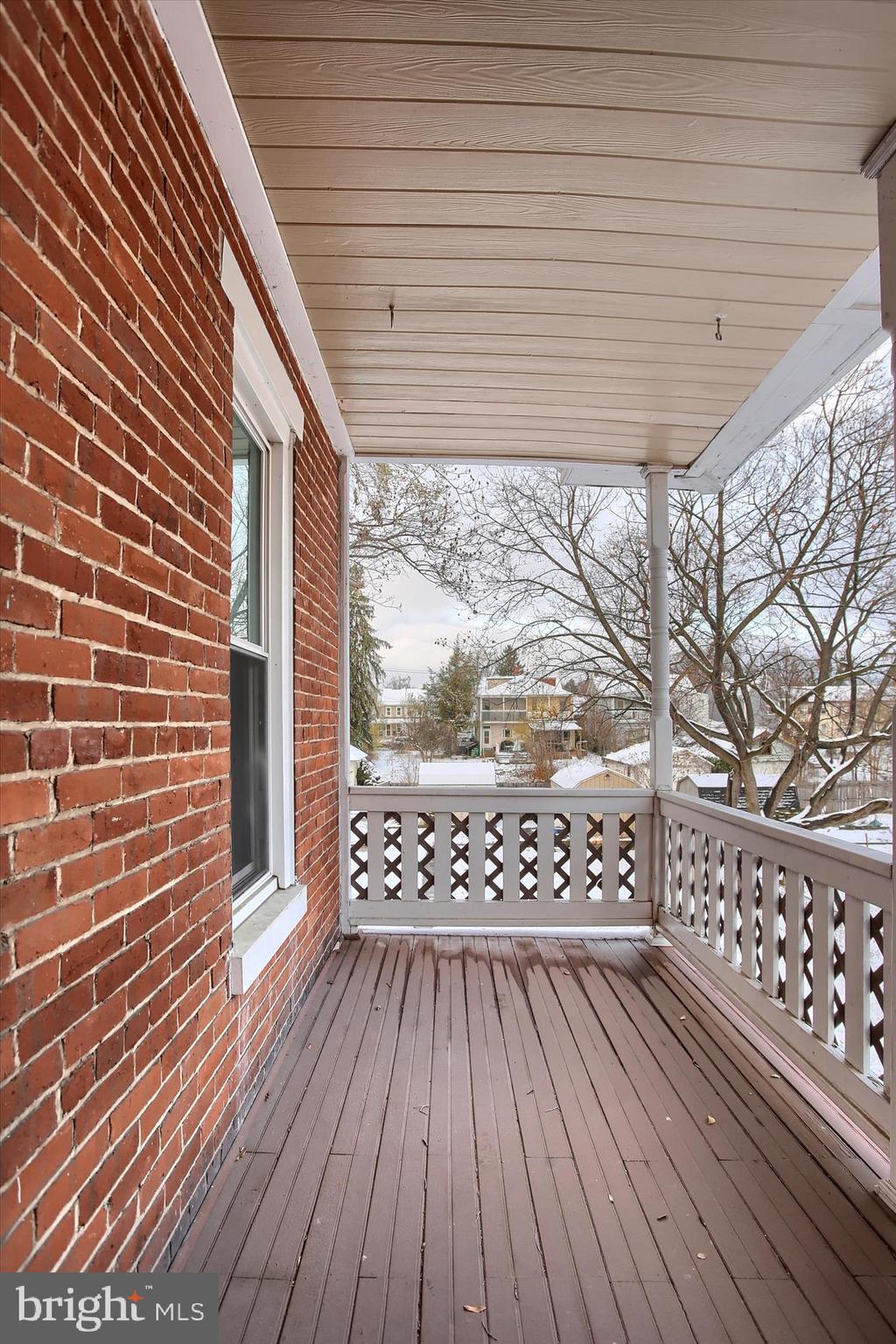 147 A Street Carlisle, PA 17013 - Photo 33 of 55 a view of a wooden deck with a glass door