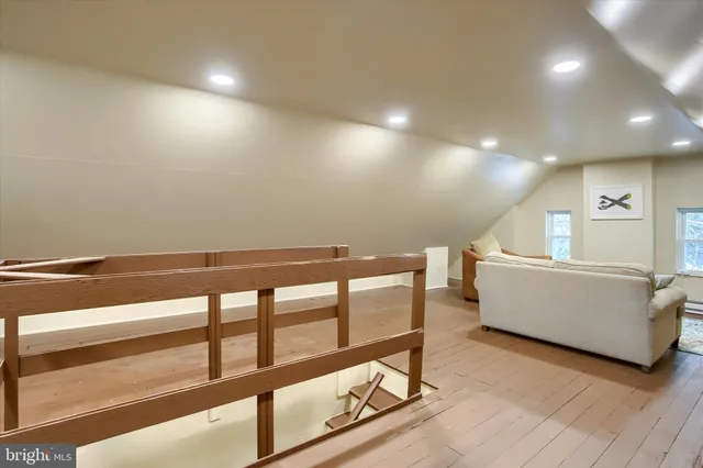 a room with lots of different kinds of flowers