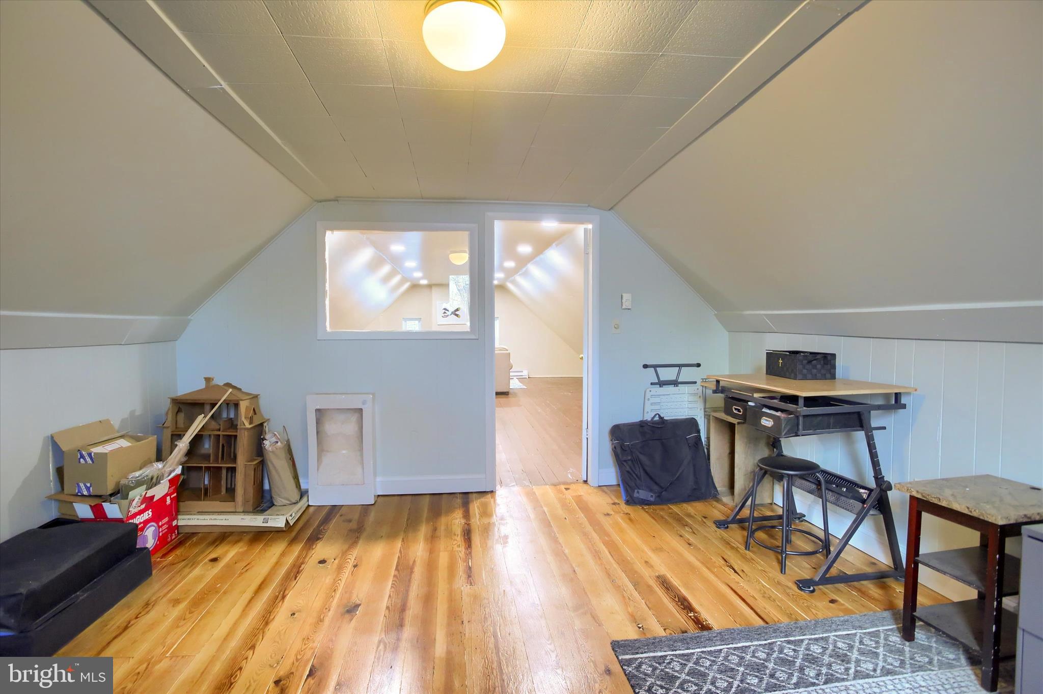 147 A Street Carlisle, PA 17013 - Photo 40 of 55 a bedroom with a bed and wooden floor