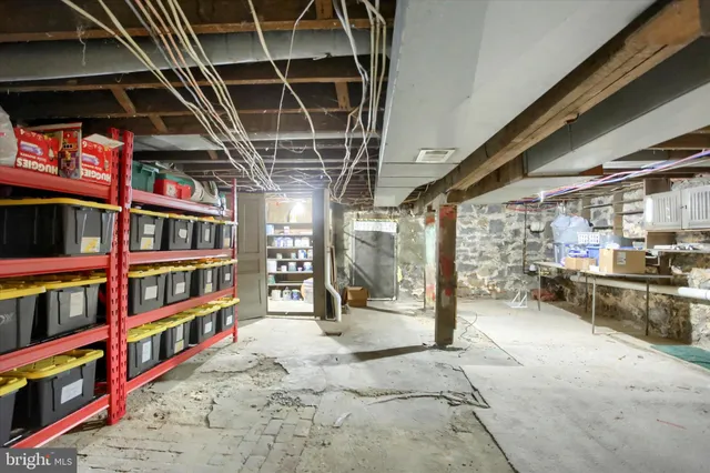 a view of a house with a snow in the yard