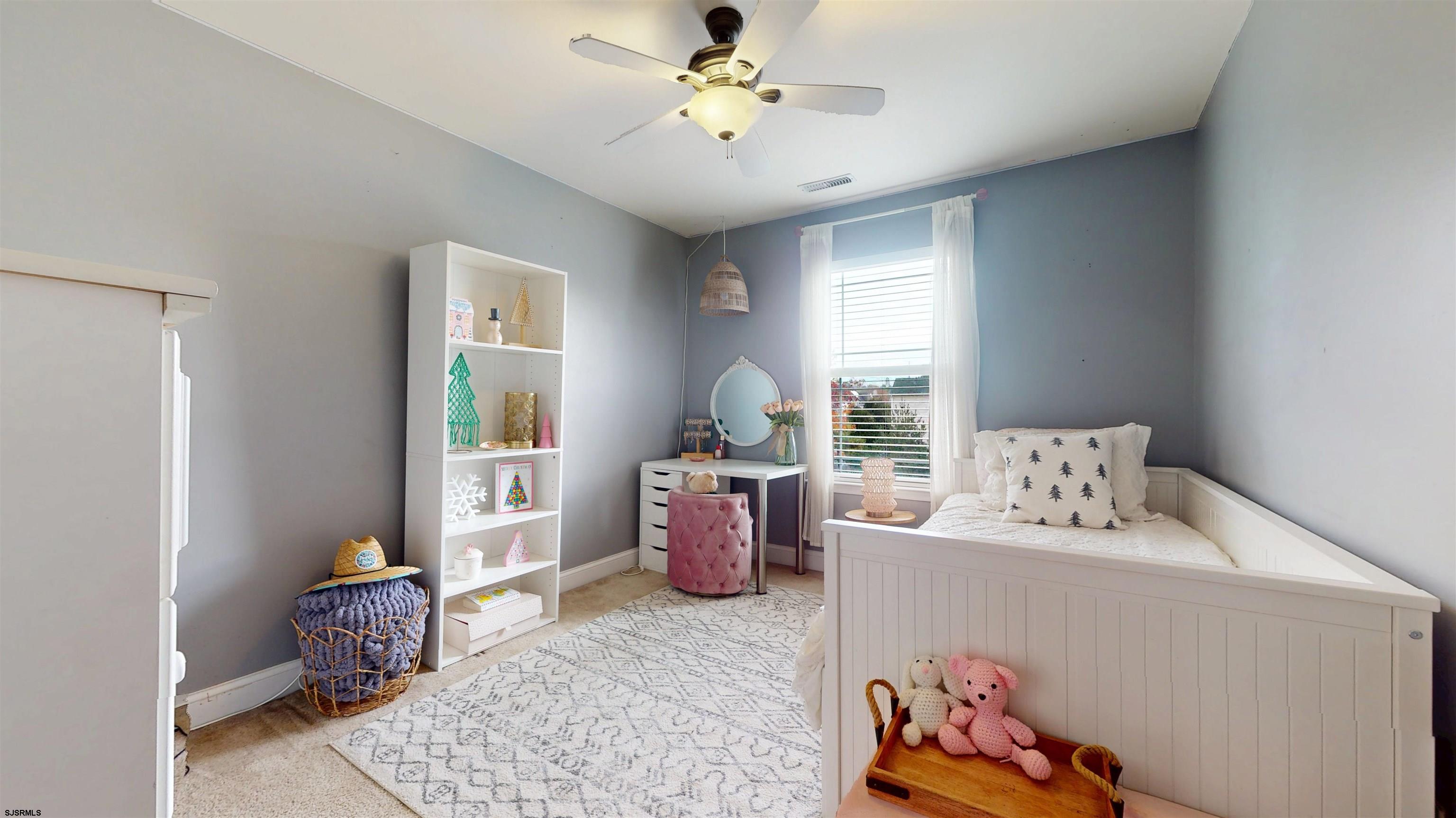 7 Fairfax Road Egg Harbor Township, NJ 08234 - Photo 23 of 34 a living room with furniture and a window