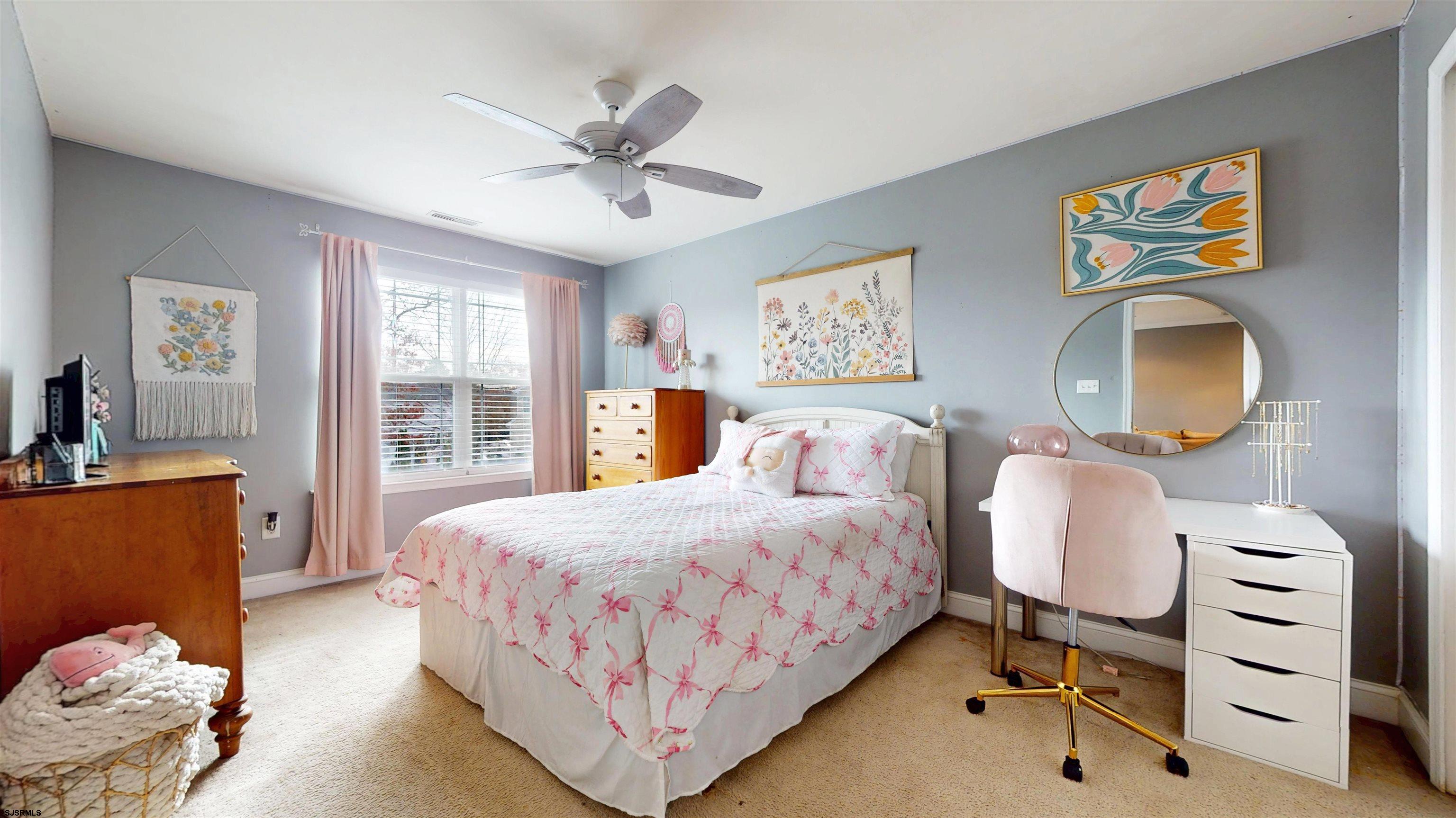 7 Fairfax Road Egg Harbor Township, NJ 08234 - Photo 24 of 34 a bedroom with a bed and wooden floor