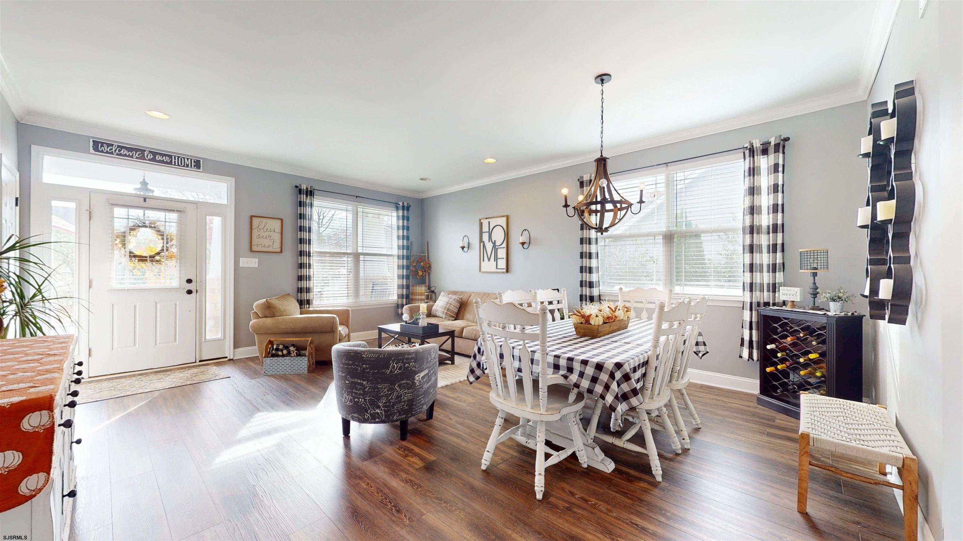 7 Fairfax Road Egg Harbor Township, NJ 08234 - Photo 3 of 34 a view of a dining room with furniture window and wooden floor