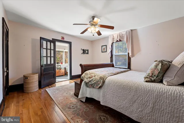 a white bath tub sitting next to a white sink