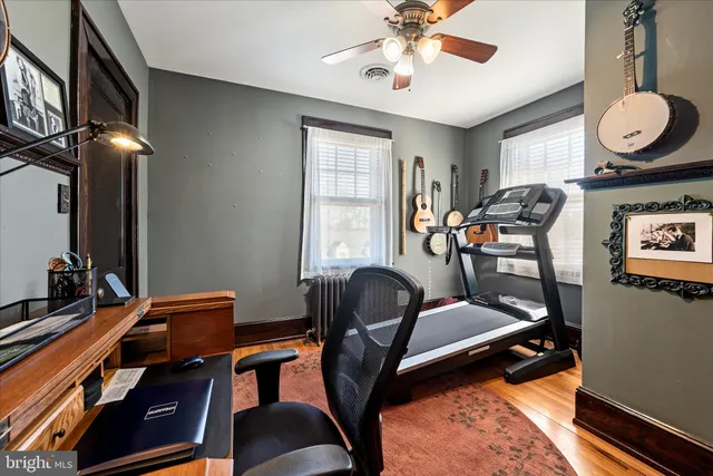 a view of a livingroom with furniture and wooden floor