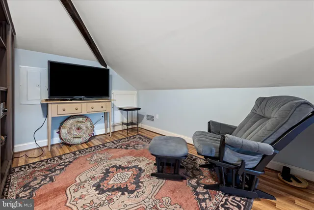 a view of a building with a yard