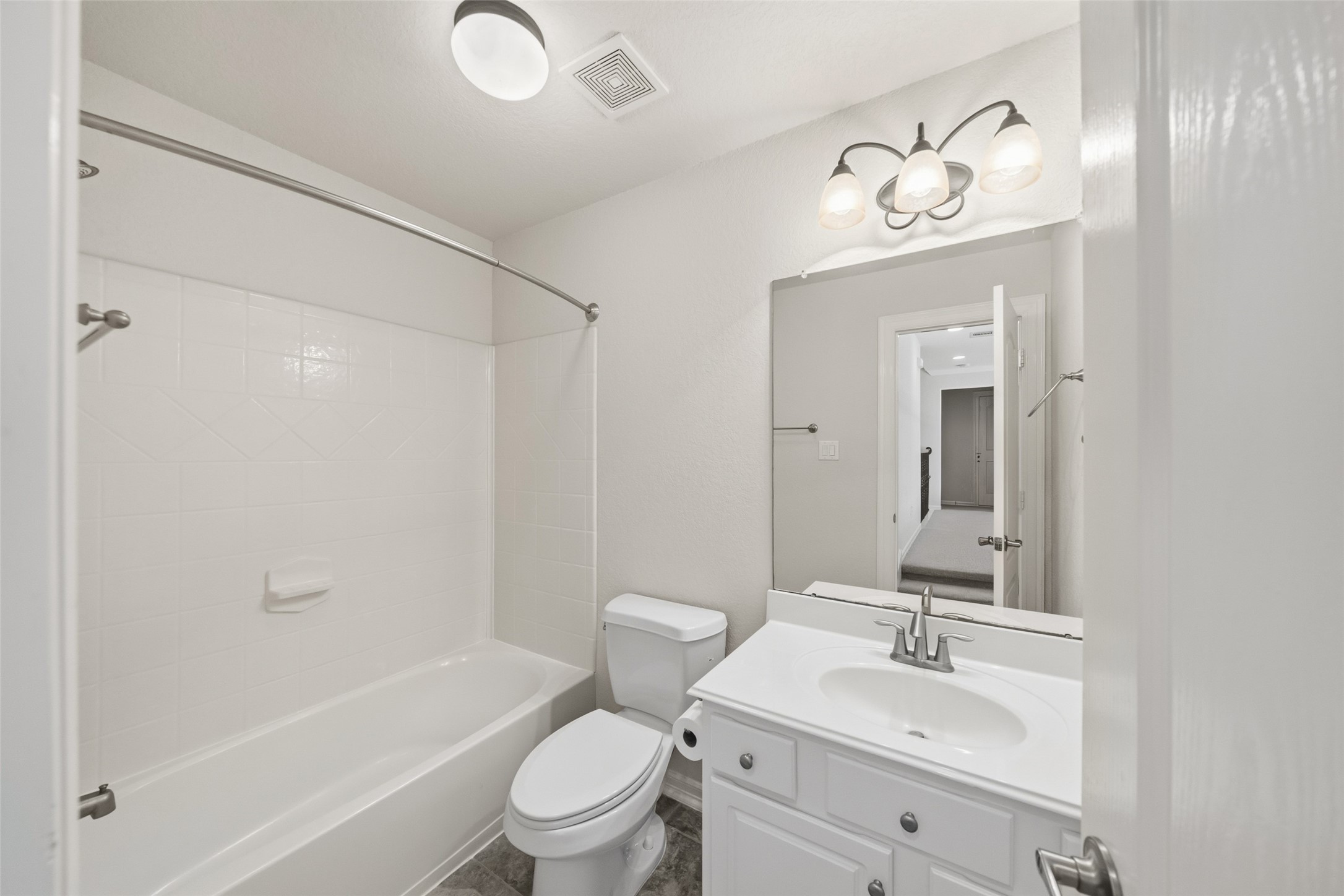 25802 Northcrest Drive Spring, TX 77389 - Photo 21 of 28 a bathroom with a sink a toilet and shower