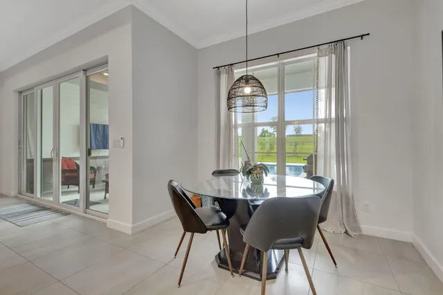 a bathroom with a double vanity sink mirror and shower
