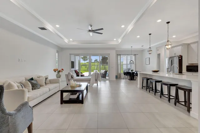 a kitchen with cabinets and stainless steel appliances