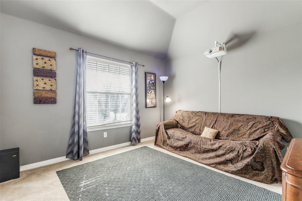 14886 Daneway Drive Frisco, TX 75035 - Photo 19 of 30 a living room with furniture and a window