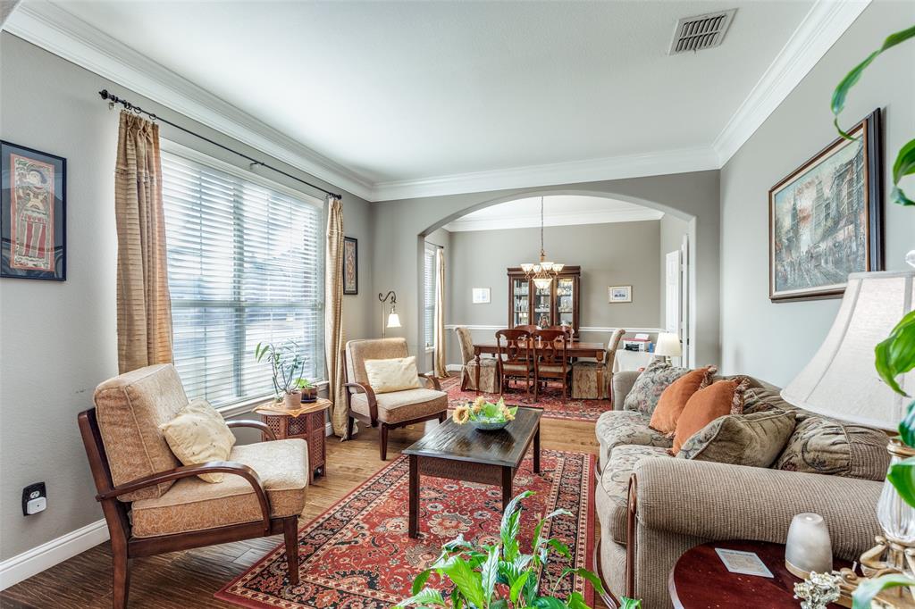 14886 Daneway Drive Frisco, TX 75035 - Photo 7 of 30 a living room with furniture and a large window