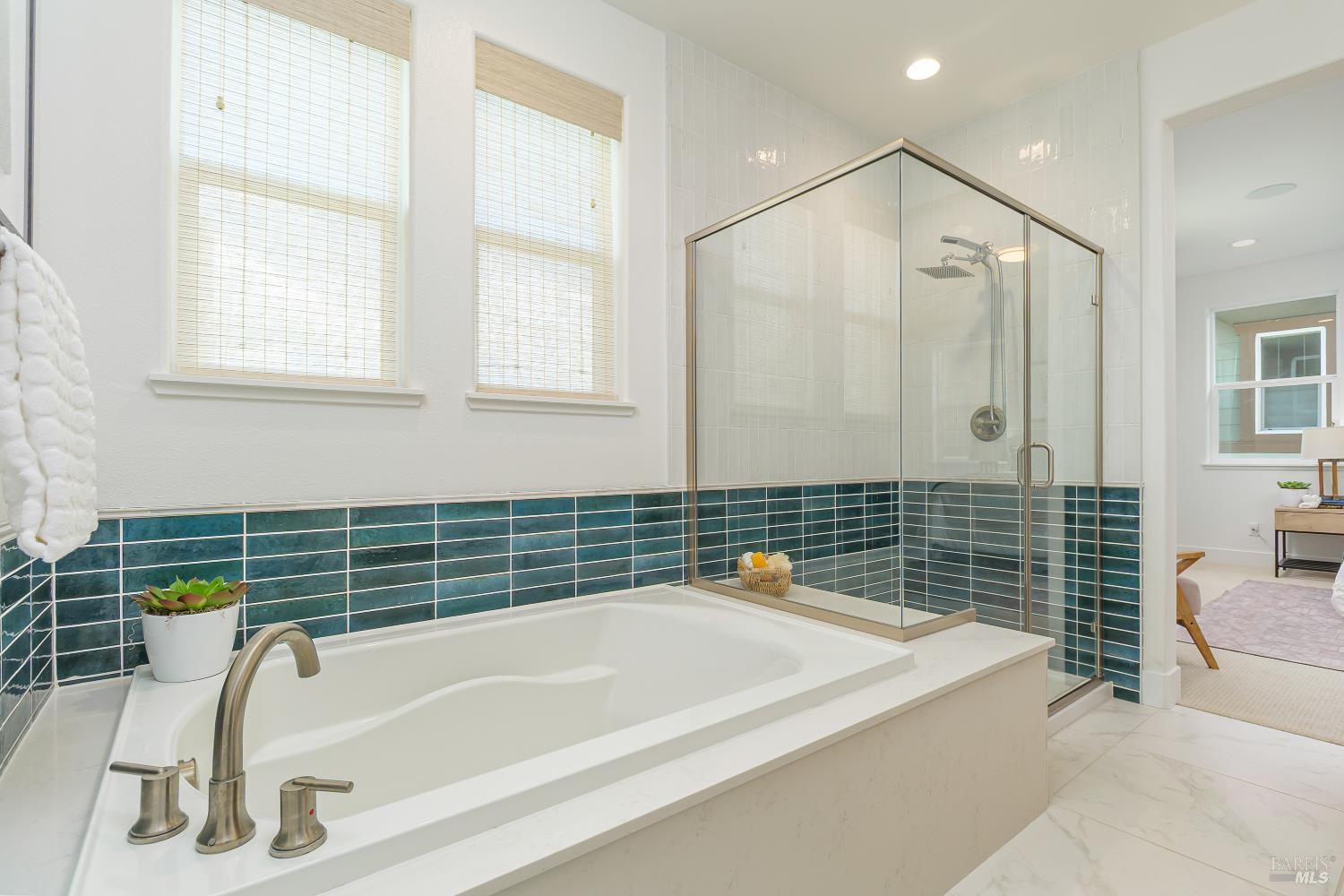 1201 Del Rancho Way Petaluma, CA 94954 - Photo 21 of 56 a bathroom with a bathtub and a shower