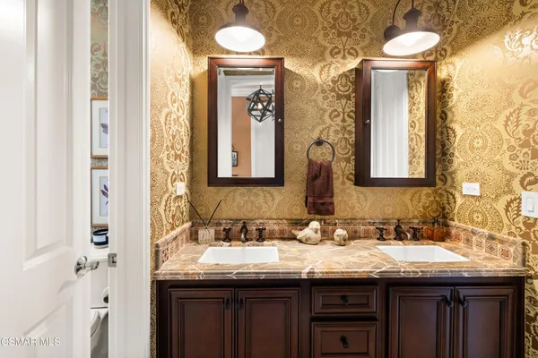 an aerial view of a house with swimming pool