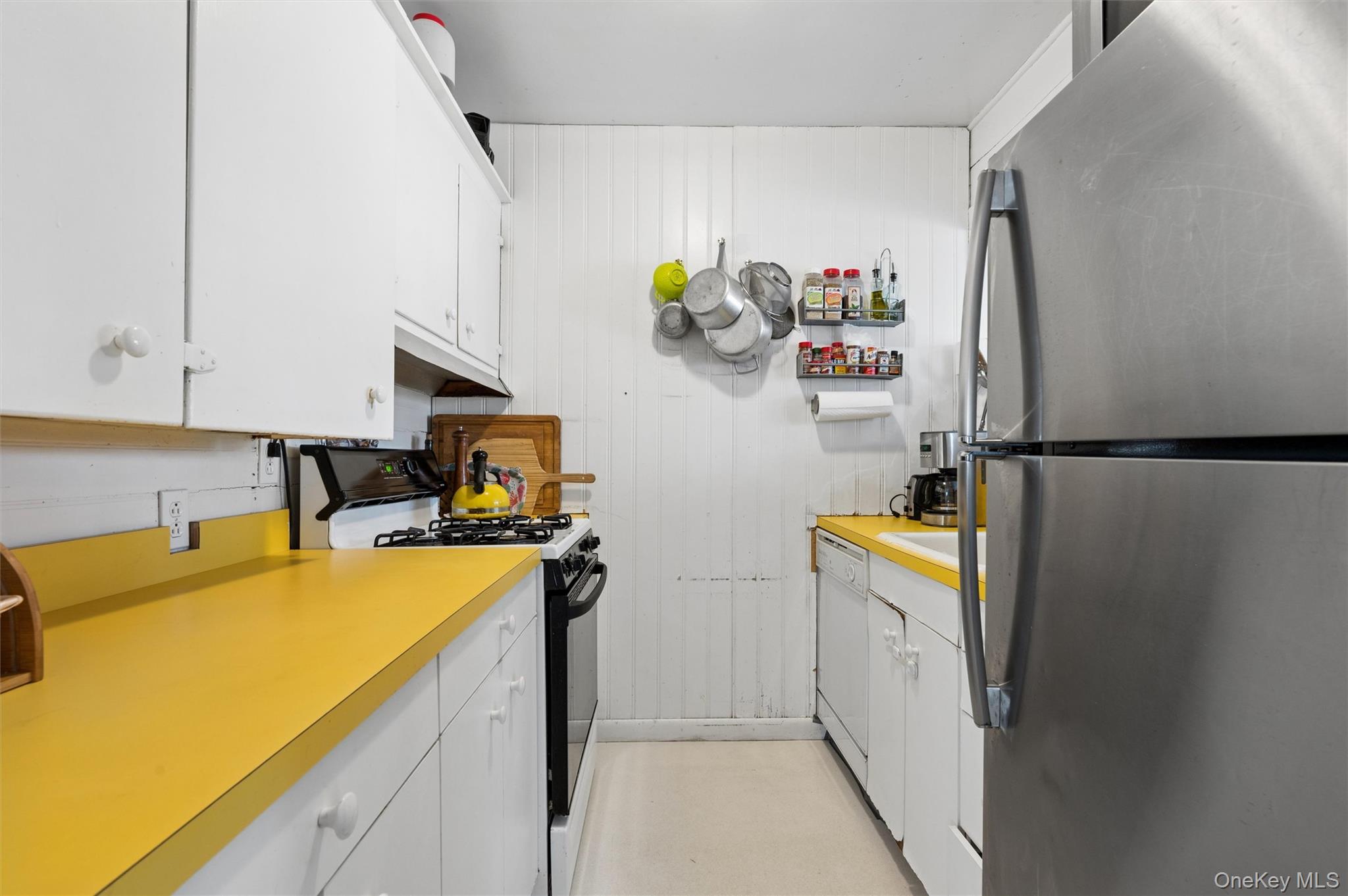 6 Private Row Hampton Bays, NY 11946 - Photo 8 of 14 a room with storage and utility
