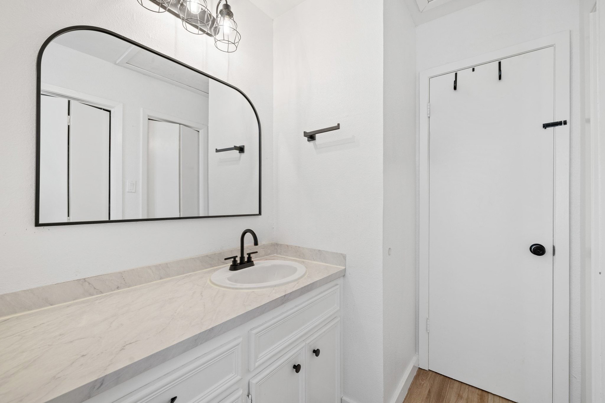 1010 West Rundberg Lane, Unit 30 Austin, TX 78758 - Photo 13 of 30 a bathroom with a sink and a mirror