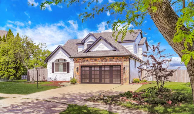 a view of empty room with wooden floor and cabinet