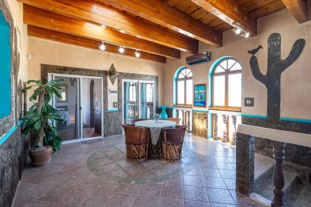 a view of living room filled with furniture