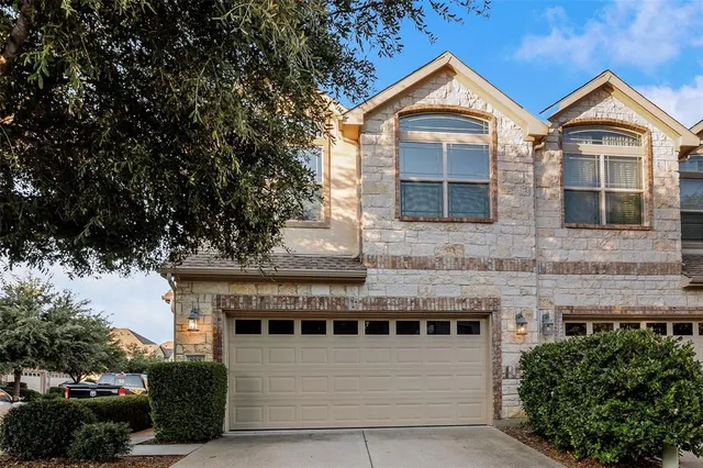 a front view of a house with windows