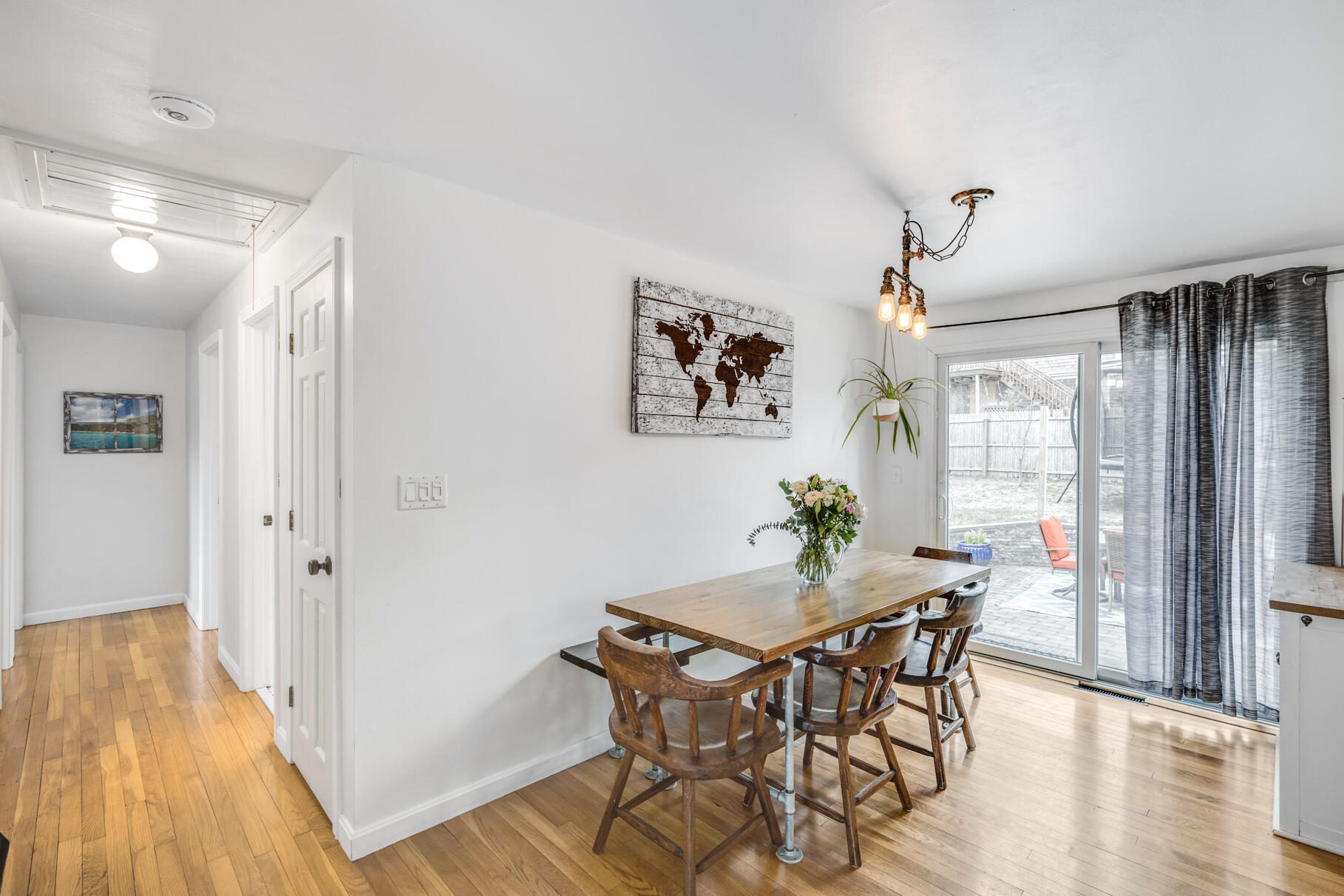 25 Cranberry Road Eastham, MA 02642 - Photo 18 of 45 a view of a dining room with furniture and wooden floor