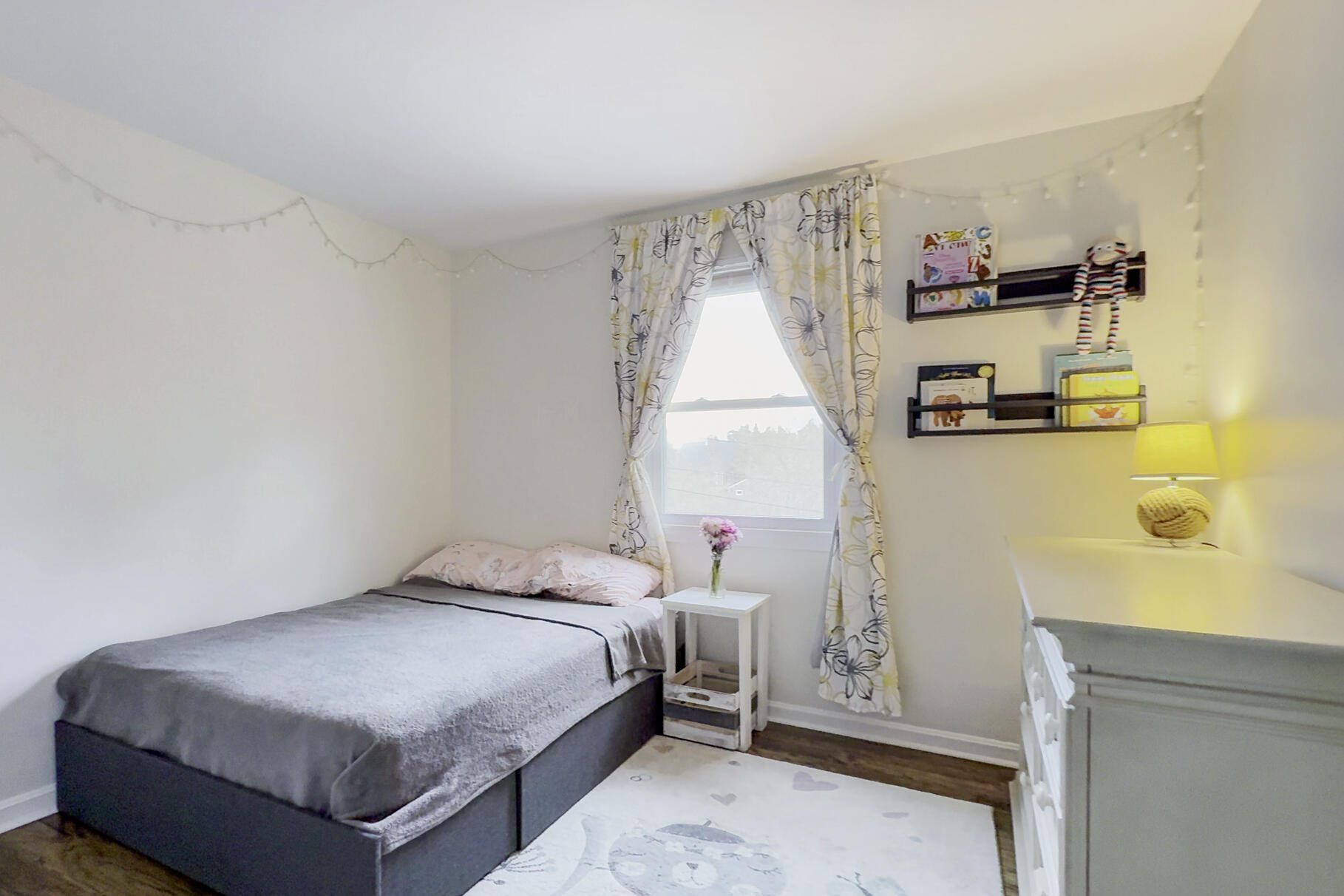 25 Cranberry Road Eastham, MA 02642 - Photo 23 of 45 a bedroom with a bed and a dresser