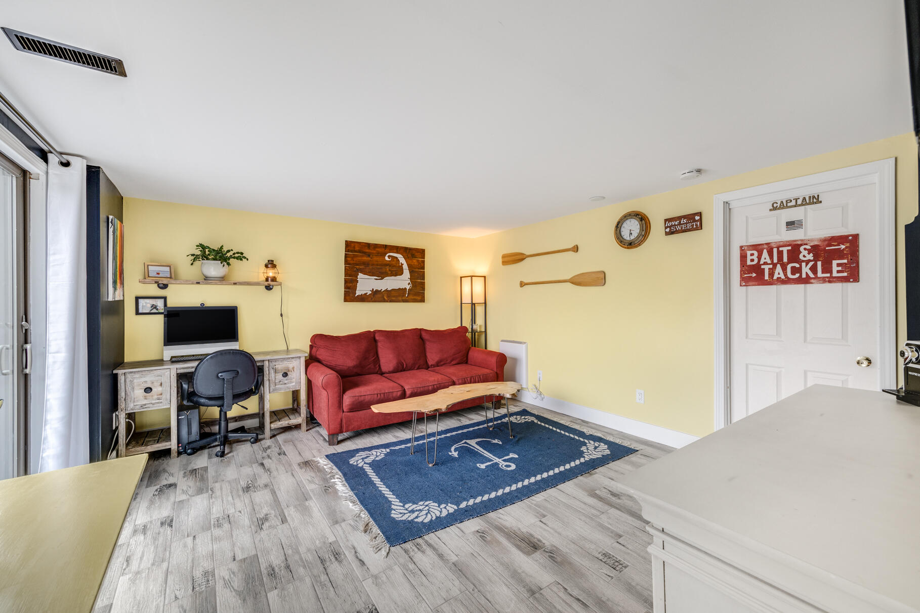 25 Cranberry Road Eastham, MA 02642 - Photo 28 of 45 a living room with furniture and a table