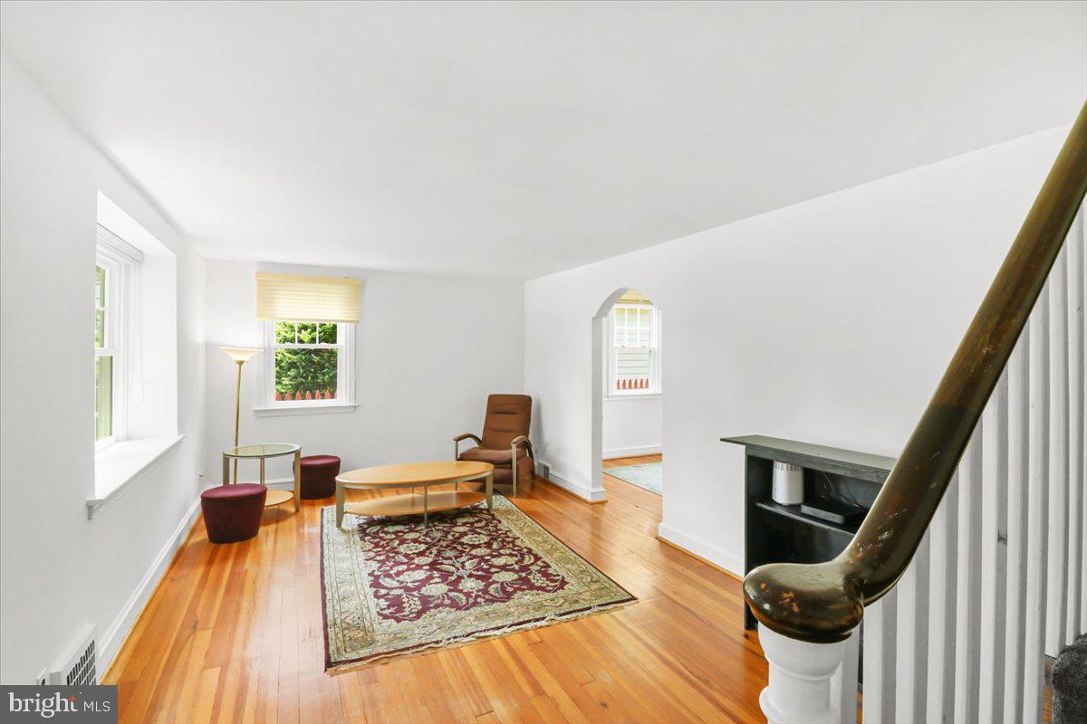 515 Arbor Road Cheltenham, PA 19012 - Photo 14 of 32 a view of a livingroom with wooden floor and furniture