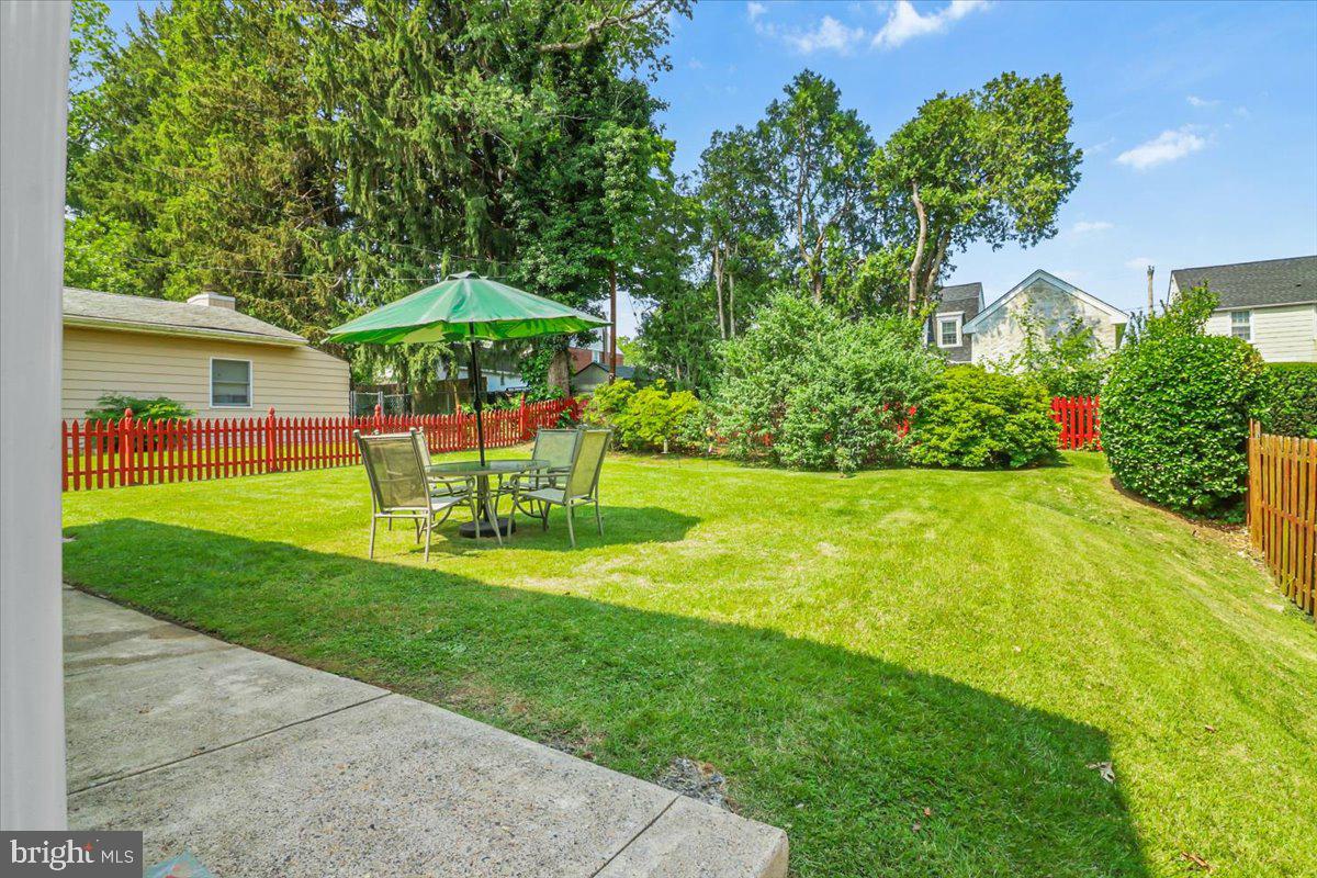 515 Arbor Road Cheltenham, PA 19012 - Photo 23 of 32 a view of a house with a yard porch and sitting area