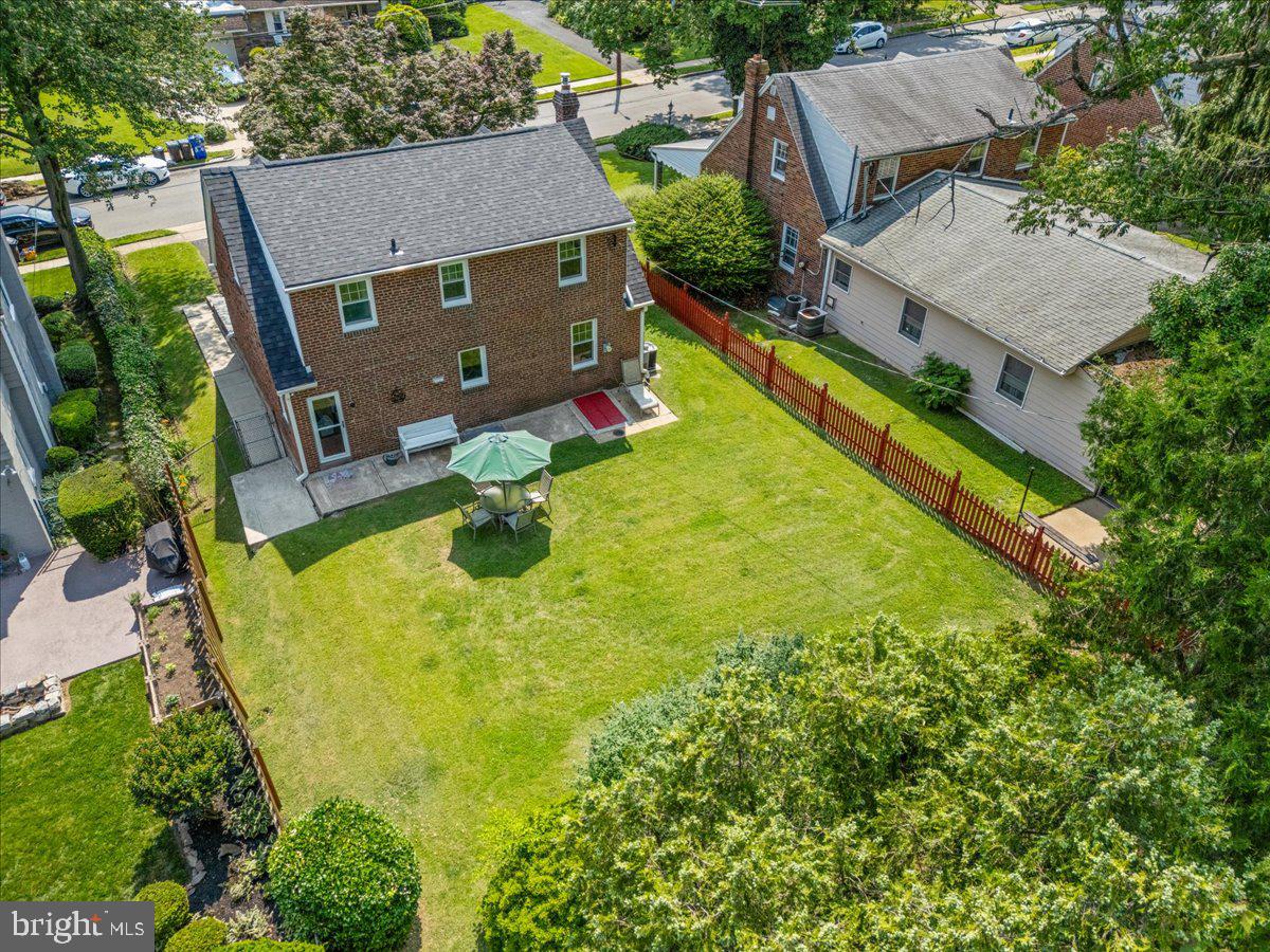 515 Arbor Road Cheltenham, PA 19012 - Photo 27 of 32 an aerial view of a house with swimming pool and large trees