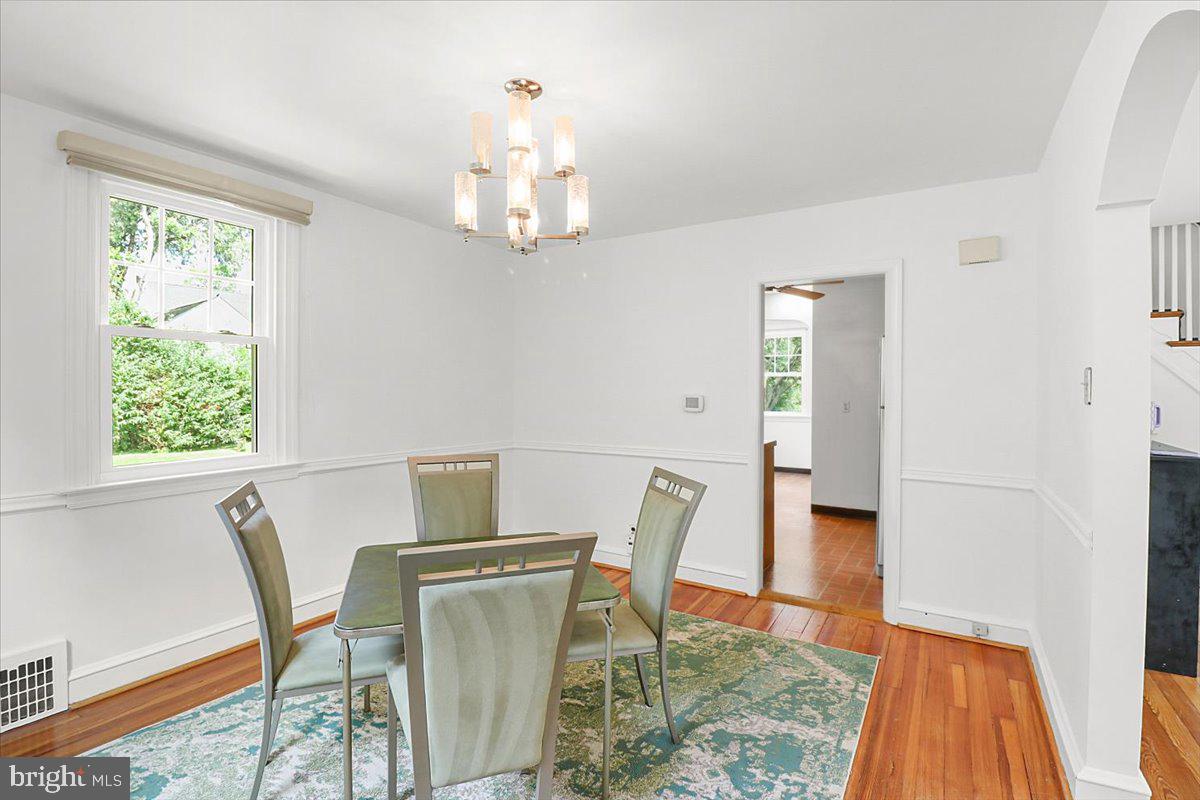 515 Arbor Road Cheltenham, PA 19012 - Photo 7 of 32 a view of a dining room with furniture and wooden floor
