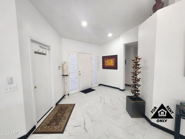 a view of a hallway with workspace