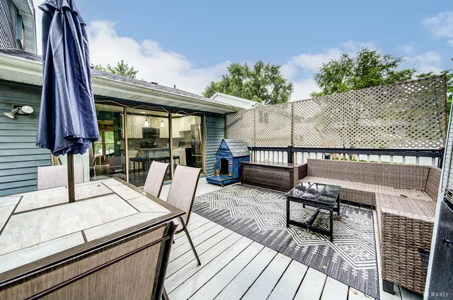 a view of outdoor space yard deck patio and outdoor kitchen
