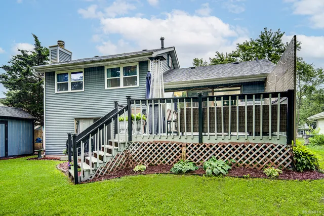 a view of a house with a deck